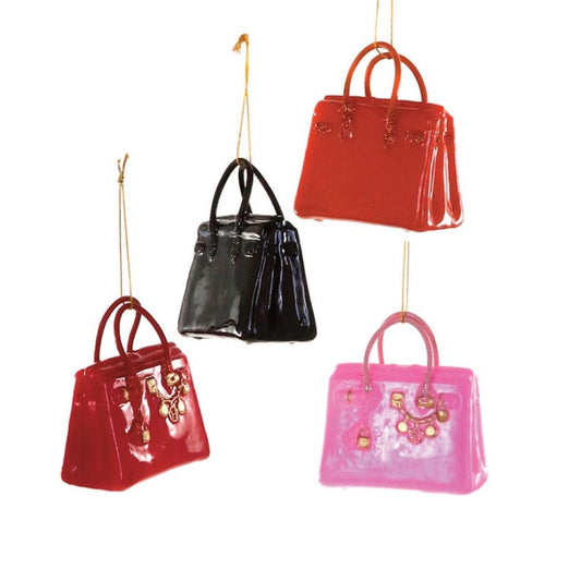 Set of colorful handbag-shaped ornaments on a white background