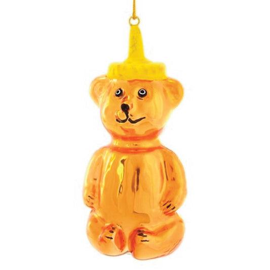 A bear-shaped container in honey yellow with a sweet face and lemon yellow squeeze-type lid and a gold corn for hanging.