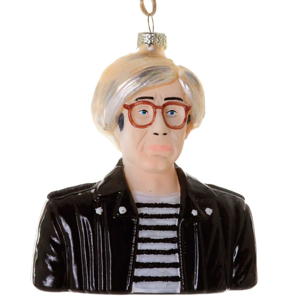 Decorative ornament shaped like Andy Warhol with white hair, glasses and a black leather jacket over a striped t shirt on a white background