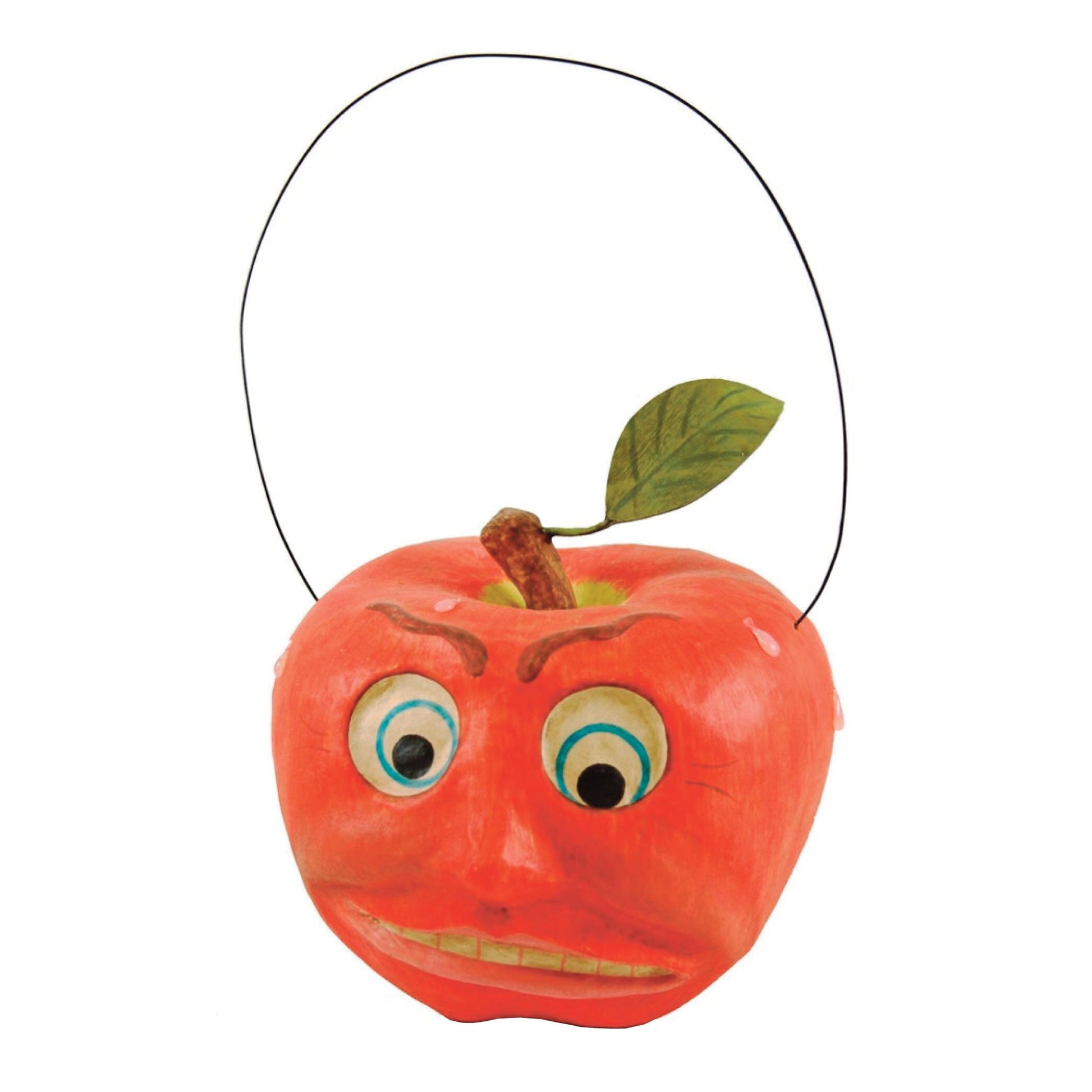 An orange apple-shaped Halloween bucket with a funny face, featuring a green leaf on top and a black wire loop handle, isolated on a white background.