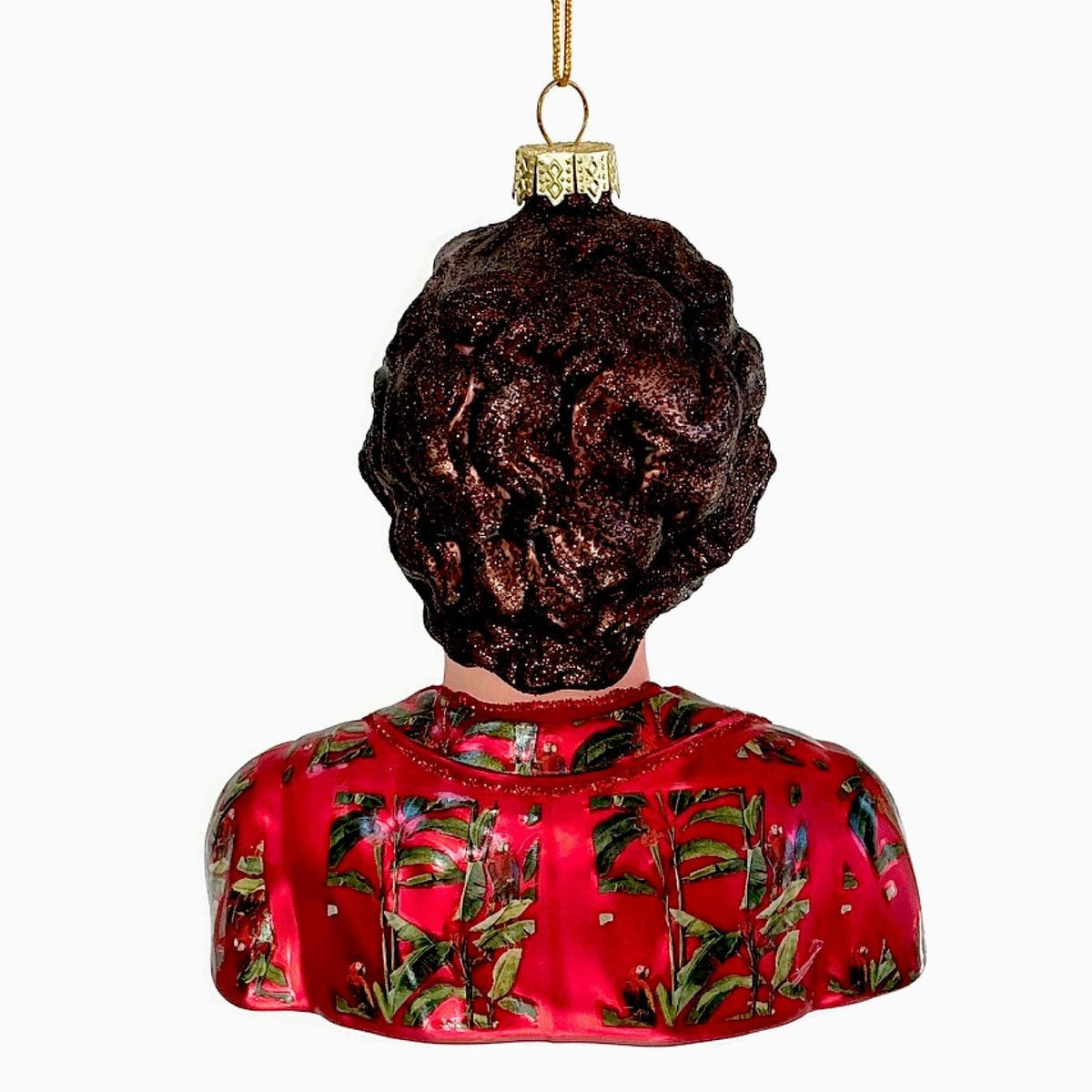 A hanging Christmas ornament shaped like a man's upper body seen from the back, with dark brown curly hair and a red floral-patterned Hawaiian top, suspended against a plain white background.