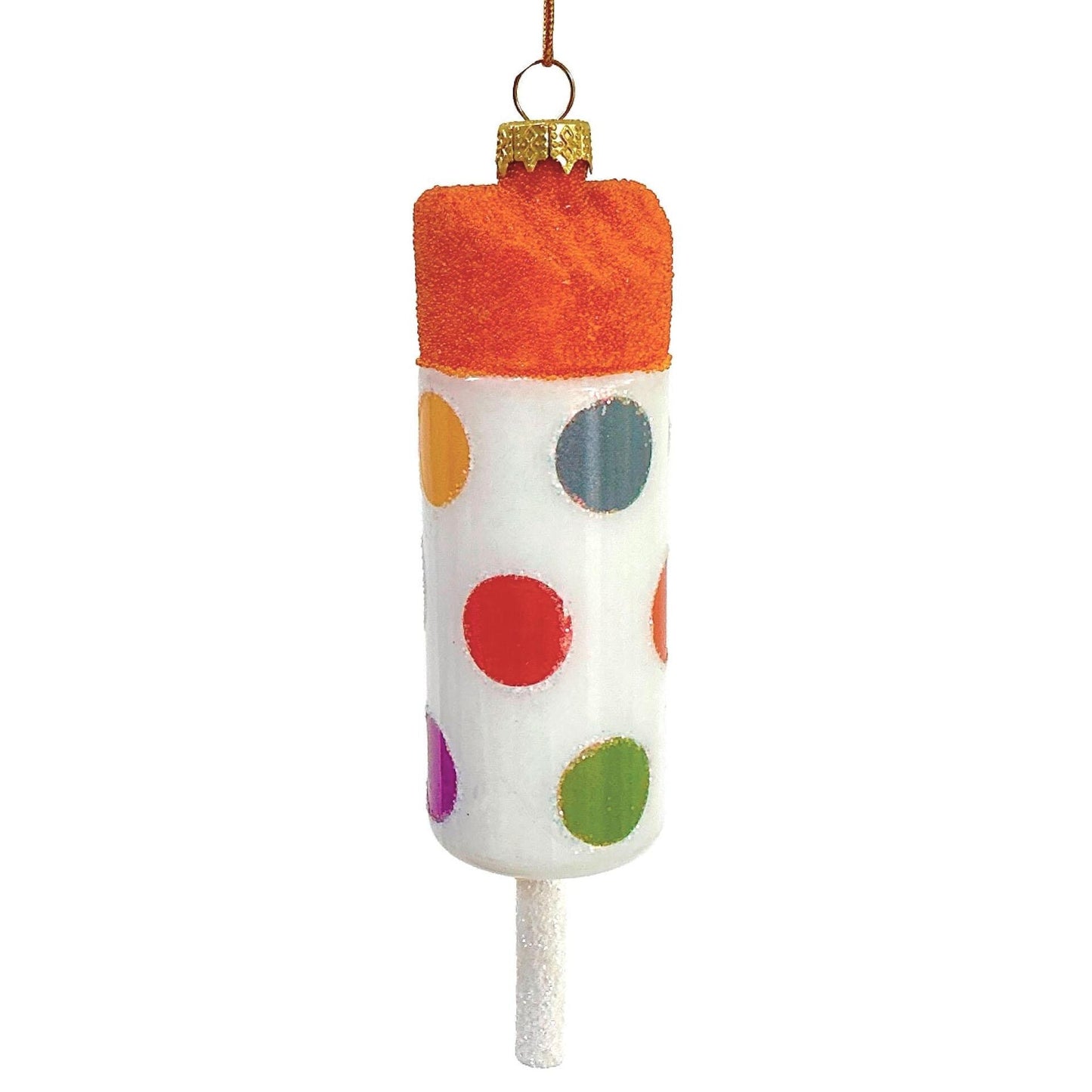 Decorative ornament resembling an orange sherbet pushup treat in a cylinder decorated with colorful polka dots with a sparkly stick at the bottom, on a white background