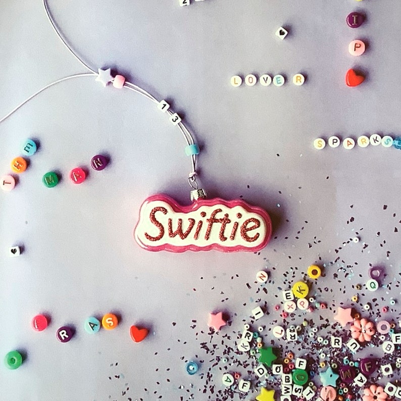 Swiftie Glass Ornament with Friendship Bracelet by Cody Foster