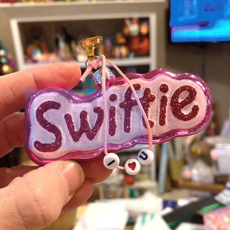 Swiftie Glass Ornament with Friendship Bracelet by Cody Foster